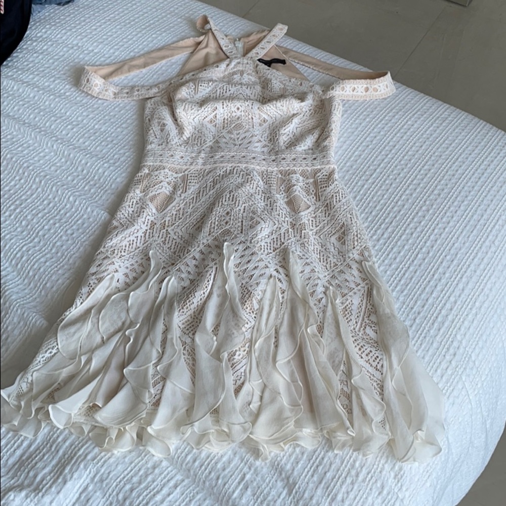 BCBG sleeveless Ivory dress.